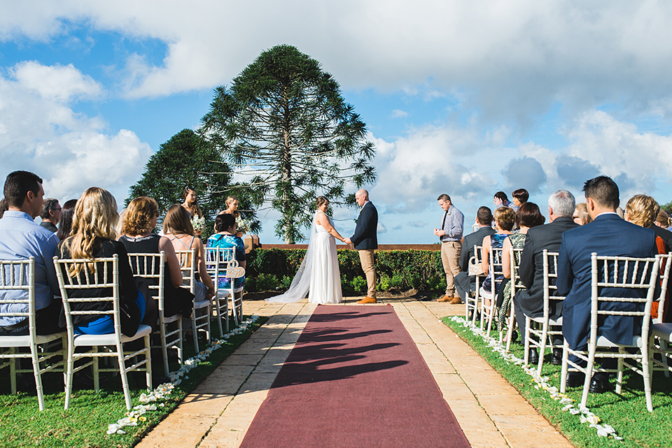 Wedding ceremony for Georgie and Jamie at Flaxton Gardens, by Maleny Wedding Photographer Lionheart Photography.