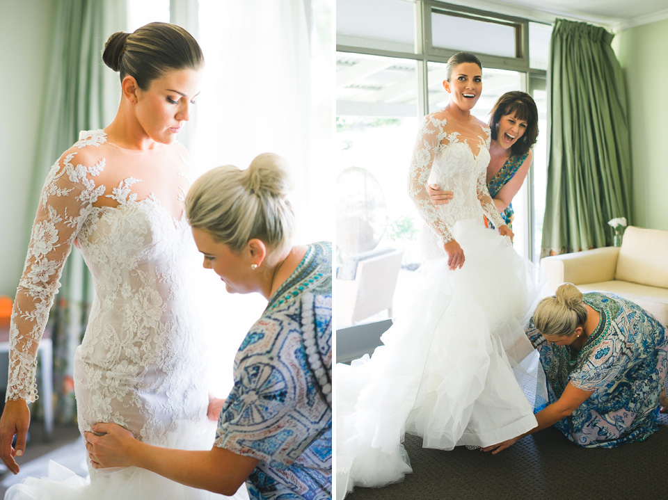 The bride putting on her Steven Khalil wedding dress in Melbourne