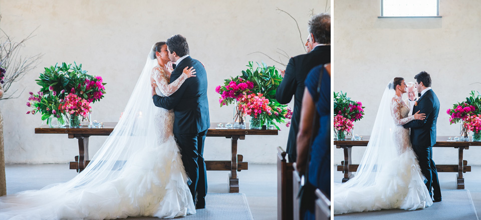First kiss, at their wedding ceremony in the chapel at Stones of the Yarra Valley in Melbourne