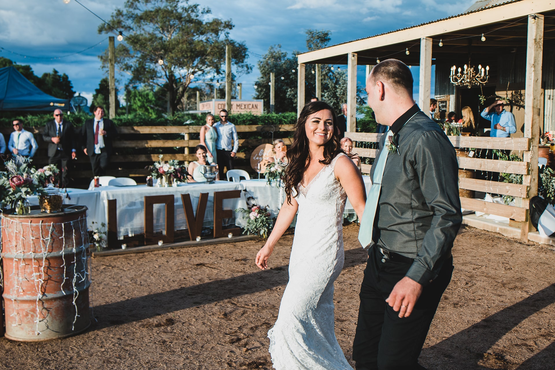 Bride and groom entering the wedding reception held at Quirindi Stables.